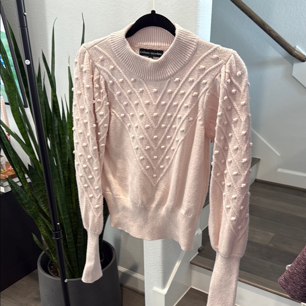 Elegant Pink Sweater with Textured Design